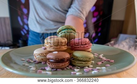 Colorful Macarons On Black Background, Close Up View