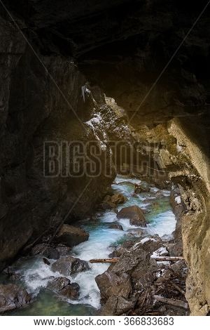 Snow-covered Icicles At Partnachklamm, Famous Tourist Destination. Partnachklamm In Garmisch-partenk