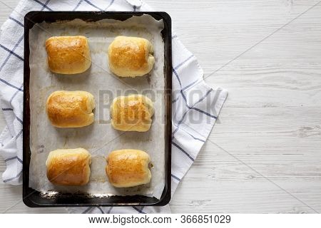 Home-baked Beef Russian Bierocks On Tray, Overhead View. Flat Lay, Top View, From Above. Copy Space.
