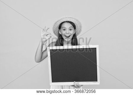 Publicity And Education. Happy Child Give Ok Sign. Little Kid Hold Blank Blackboard. School Publicit