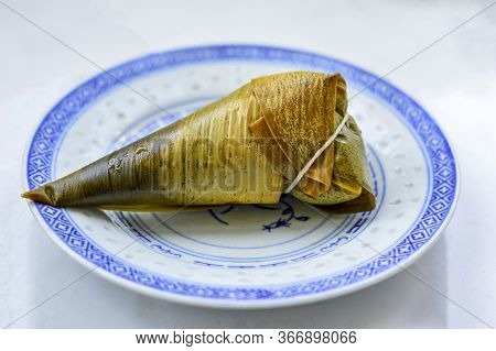 Cooked Zongzi Placed On A Plate. Zongzi Is The Traditional Chinese Rice Dumplings For Dragon Boat Fe