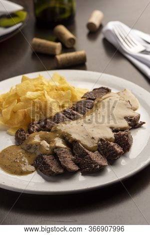 Steak With Sauce With Potato Chips
