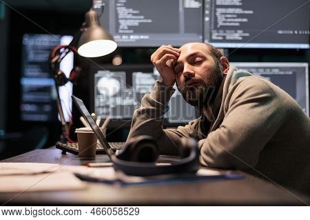 Exhausted App Developer Feeling Sleepy Late At Night, Falling Asleep In Office Writing Code On Termi