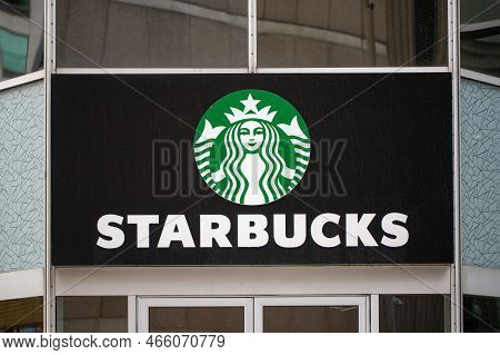 Ottawa, Canada - November 10, 2022: Signage Of Starbucks Cafe. Company Signboard Starbucks Coffee.