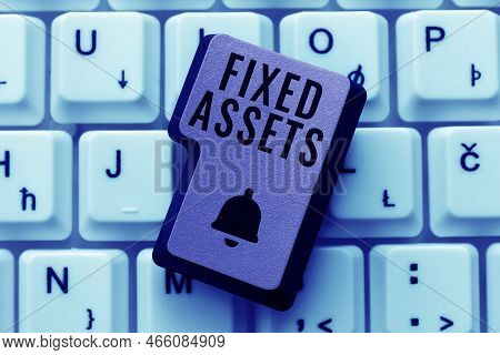 Hand Writing Sign Fixed Assets. Conceptual Photo Long-term Tangible Piece Of Property Or Equipment A