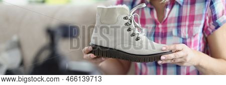 Close-up Of Woman Present Trendy White Boot Showing On Camera, Try To Sell Online. Comfy Shoe For Wi