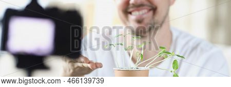 Portrait Of Middle Aged Man Recording On Video How He Growing Plants At Home. Fan Of Botany, New Hob
