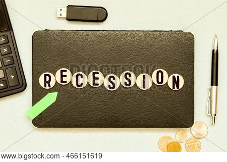 Recession Up Or Down Symbol. Concept Word Recession And Up And Down Arrow On Wooden Blocks On A Beau