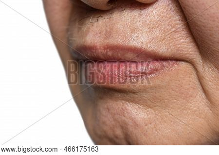 Skin Folds And Creases In Face Of Asian Elder Man.