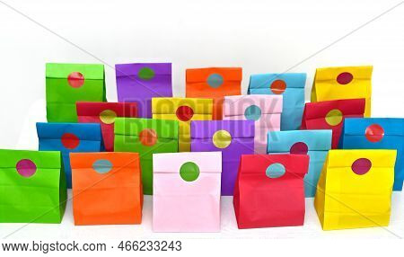 Set Of Colorful Shopping Folded Paper Bags On White Background. Paper Shopping Bags Mockup, Blank Re