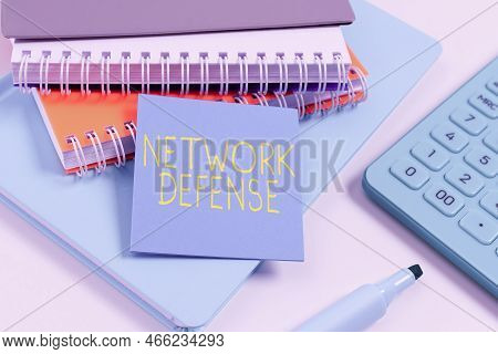 Text Sign Showing Network Defense. Word Written On Easures To Protect And Defend Information From Di