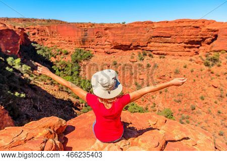 Close Up On Woman With Open Arms At The Edge Of Kings Canyon. In Watarrka National Park. King Canyon