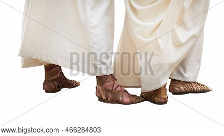 Ancient Roman People In Vintage Clothes And Caligae Leather Sandals, Isolated On A White Background.