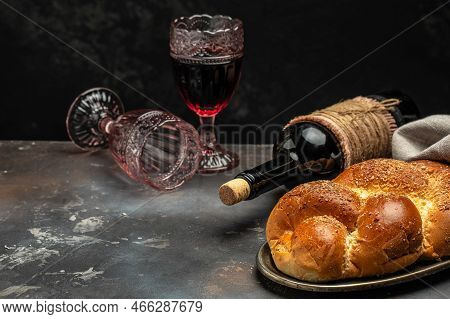 Shabbat Shalom Challah Bread, Shabbat Wine On A Dark Background, Place For Text, Top View,