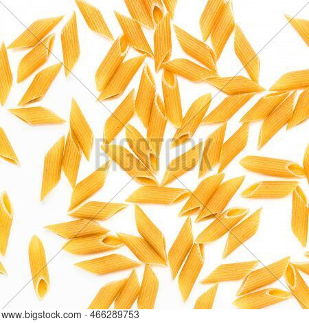 Penne Rigate Pasta. Pasta On White Background. Dry Penne Rigate Pasta Isolated Over White. Top View.