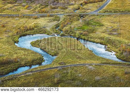 View Of Curvy River In Green Inland Of Iceland
