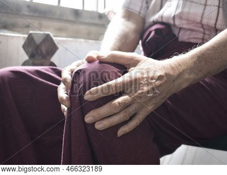 Knee Joint Pain In Asian Myanmar Elder Man. Concept Of Osteoarthritis, Rheumatoid Arthritis, Patella