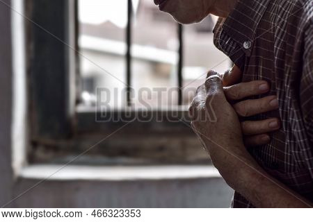 Asian Elder Man Suffering From Central Chest Pain. Chest Pain Can Be Caused By Heart Attack, Myocard