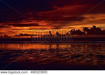 Landscape Scene Of Sunset At Chaung Tha Beach. Cloudy Sky. Ending Hour At Seaside.