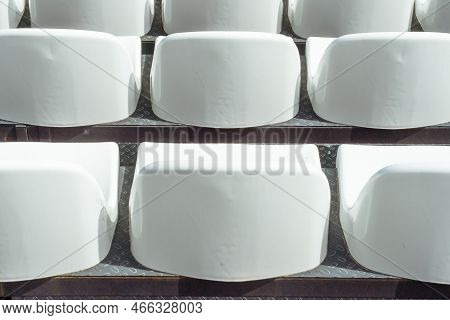 Seats Of Tribune On Sport Stadium. Concept Of Fans, Chairs For Audience, Cultural Environment Concep