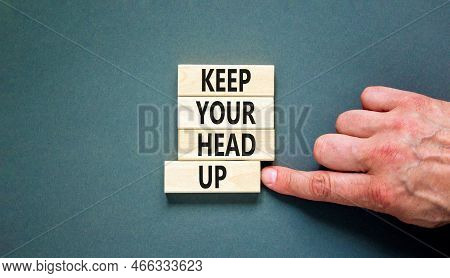 Keep Your Head Up Symbol. Concept Words Keep Your Head Up On Wooden Cubes. Beautiful Grey Table Grey