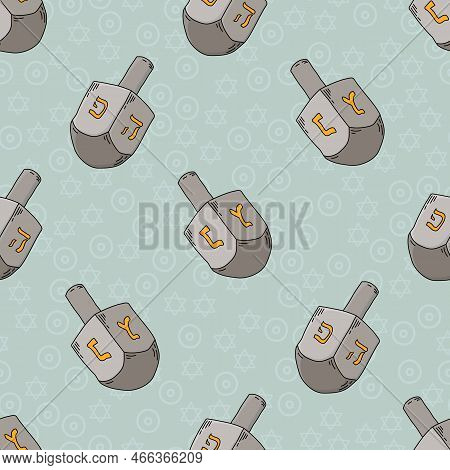 Seamless Pattern With Ethnic Judaic Hanukkah Dreydl On Blue Background.