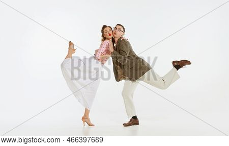 Two Emotional Dancers In Vintage Style Clothes Dancing Swing Dance, Rock-and-roll Or Lindy Hop Isola