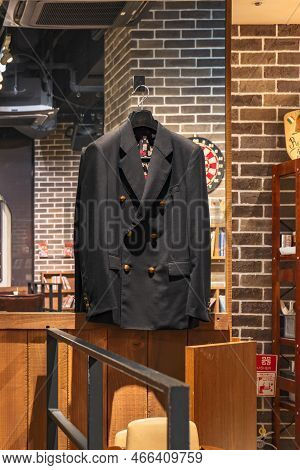Tokyo, Japan - March 05 2021: At The Foot Of The Tokyo Tower, The Cafe Mugiwara, Which Is Part Of Th