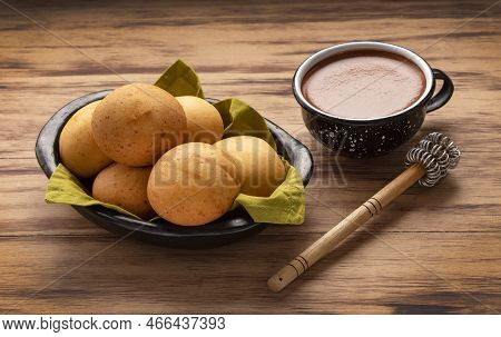 Baked Almojabanas And Chocolate For Breakfast - Typical Colombian Food