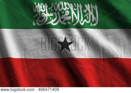 Somaliland Flag With Big Folds Waving Close Up Under The Studio Light Indoors. The Official Symbols 