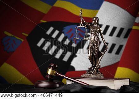 Swaziland Flag With Statue Of Lady Justice, Constitution And Judge Hammer On Black Drapery. Concept 