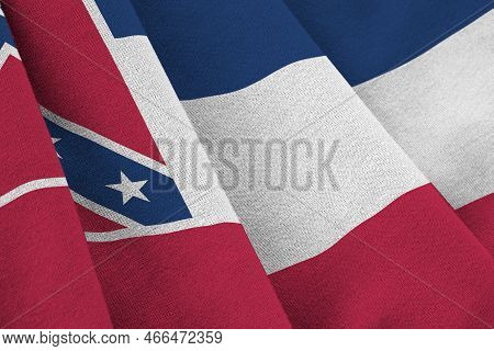 Mississippi New Us State Flag With Big Folds Waving Close Up Under The Studio Light Indoors. The Off