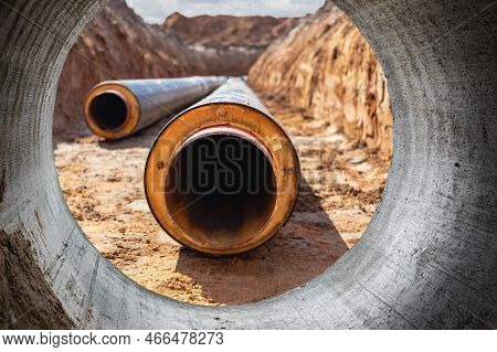 Laying Of High Pressure Pipes For Hot Water Supply. Underground Pipeline Works. Heating. Insulated P