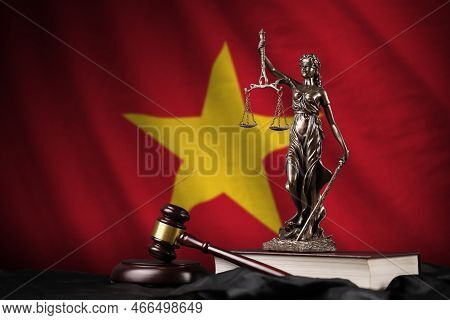 Vietnam Flag With Statue Of Lady Justice, Constitution And Judge Hammer On Black Drapery. Concept Of