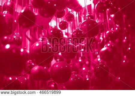 A Lot Of Christmas Ball Decorations In Color Of The Year 2023 Vibrates With Vim And Vigor Magenta