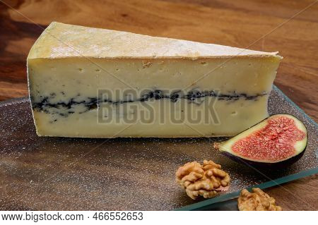 French Semi-soft Cow Milk Cheese Morbier From Franche-comte Region With Thin Black Layer And Strong