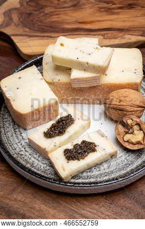 Italian Cheese Collection, Yellow Taleggio Cheese With Black Truffles Mushrooms