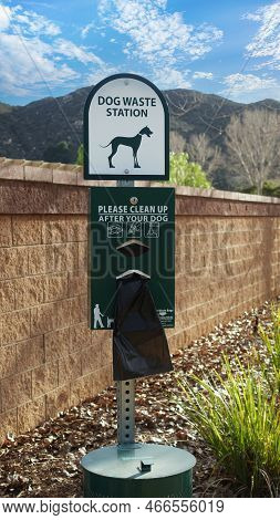 Dog Waster Station Sign With Plastic Bags For Waste. Clean After Your Dog Waste Station With Baggies