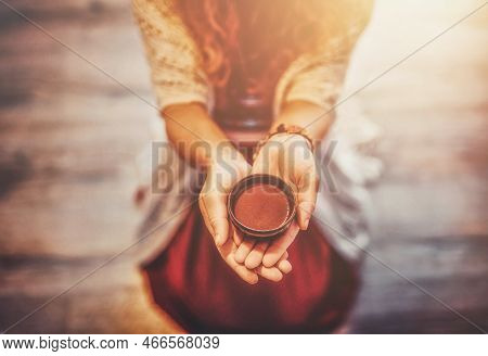Cacao Ceremony, Heart Opening Medicine. Ceremony Space. Cacao Cup In Womans Hand.