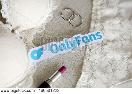 Ternopil, Ukraine - September 6, 2022 Onlyfans Paper Logotype Among Lipstick, Earrings And Women Lin