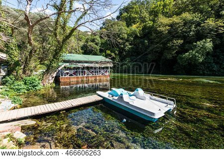 Vlora County, Albania - September 10, 2021: Cozy Restaurant Near The National Landmark Spring Blue E