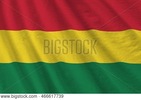 Bolivia Flag With Big Folds Waving Close Up Under The Studio Light Indoors. The Official Symbols And