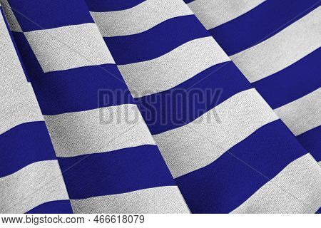 Greece Flag With Big Folds Waving Close Up Under The Studio Light Indoors. The Official Symbols And 