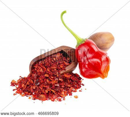 Fresh And Dry Ground Red Chili Peppers Isolated On White Background. Capsicum Baccatum Or Bishop's C