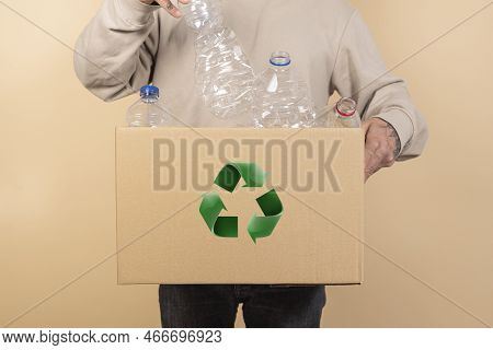 Plastic Bottles For Recycling Outdoors. Reduce Reuse Recycle. Waste Sorting Tray. Recycling At Home.