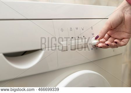 A Person Chooses A Washing Mode With A Switch. Washing Mode. Temperature Mode. Washing Machine.high 