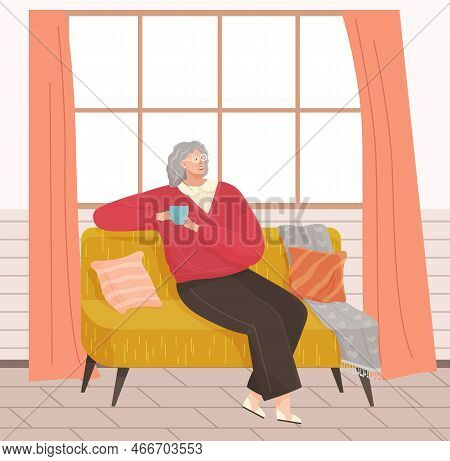 Relaxed Senior Grey Haired Woman In Glasses Sitting On Couch Drinking Tea Thinking About Something. 