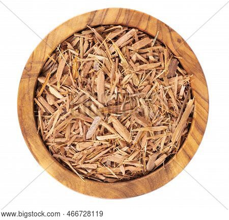 Catuaba Bark In Wooden Bowl, Isolated On White Background. Trichilia Catigua Bark. Chuchuhuasha, Tat