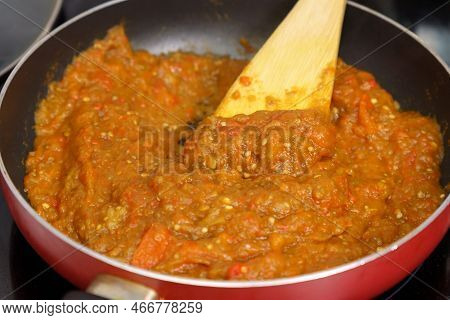 Cooking Spread Called Ajvar From Red Peppers And Eggplants. Selective Focus