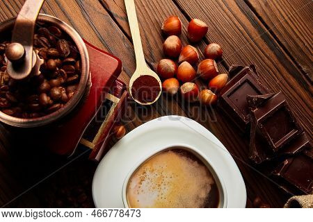 A Coffee Grinder And Coffee Background A